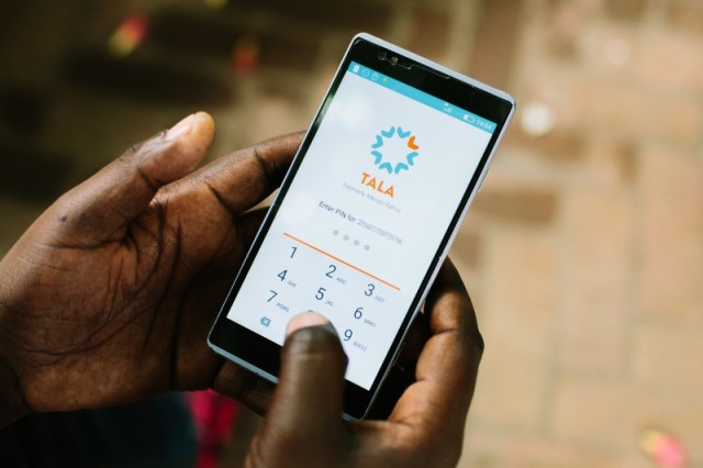 hands hold smart phone with Tala app open